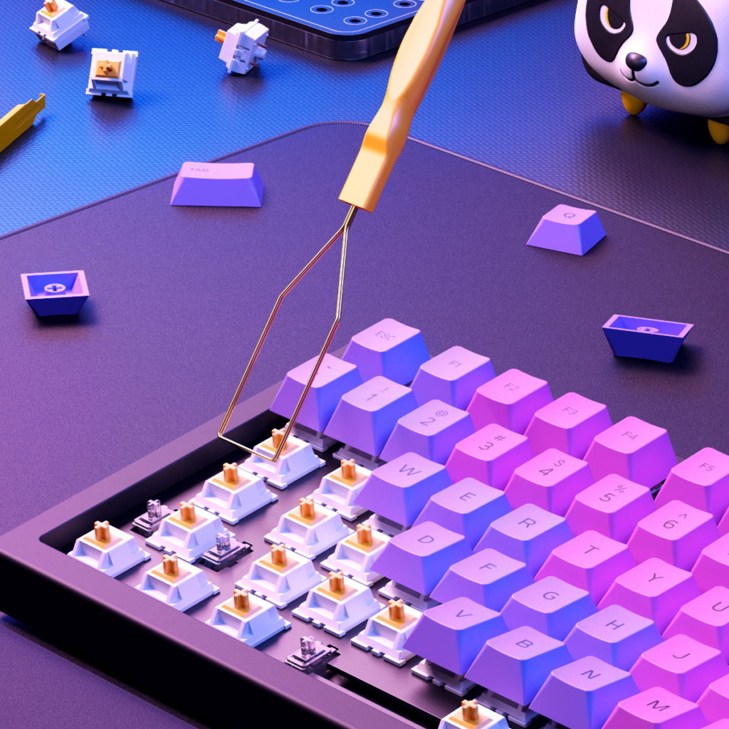 A selection of Glorious PC Gamers Race accessories. Including Nebula GPBT Keycaps, the Kepcap Puller, and a vinyl Panda.