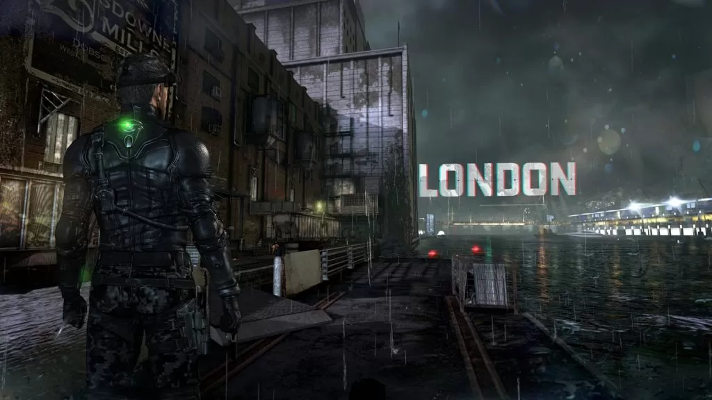 Screenshot of Tom Clancy's Splinter Cell Blacklist from Ubisoft showing a derelict factory by a river and the text London