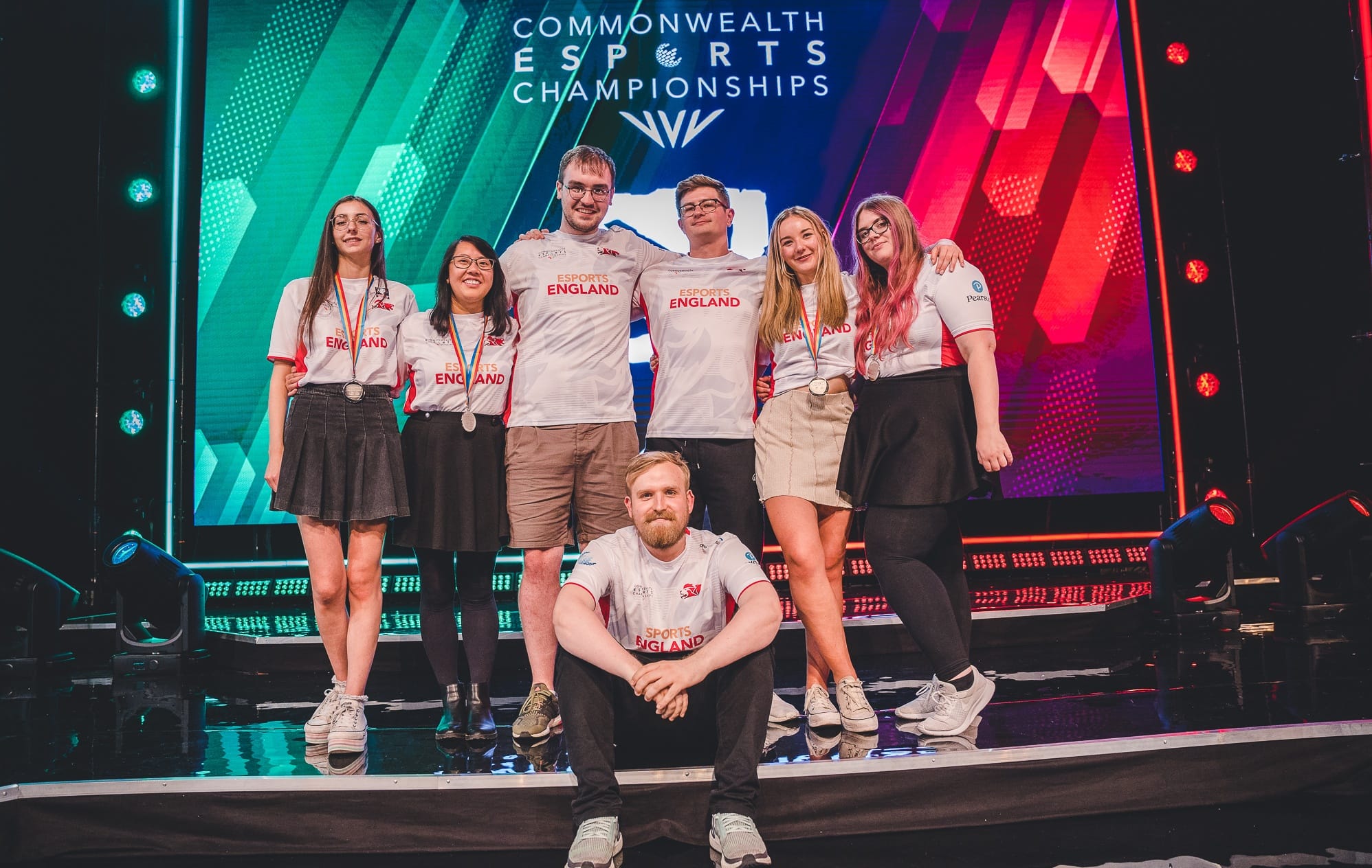7 members of the England Esports team posing with their medals after the Womens Dota 2 esports event at the Commonwealth Esports Championships