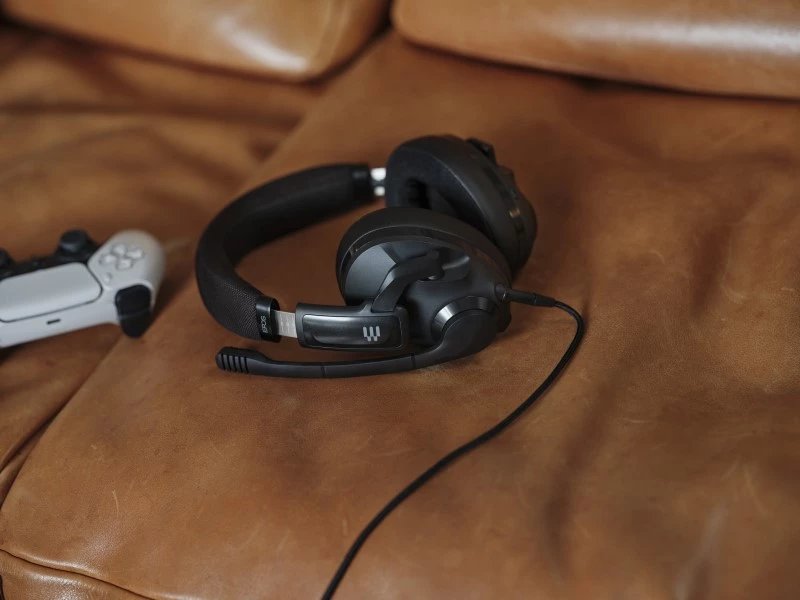 EPOS H3 Hybrid Headset black on brown leather sofa