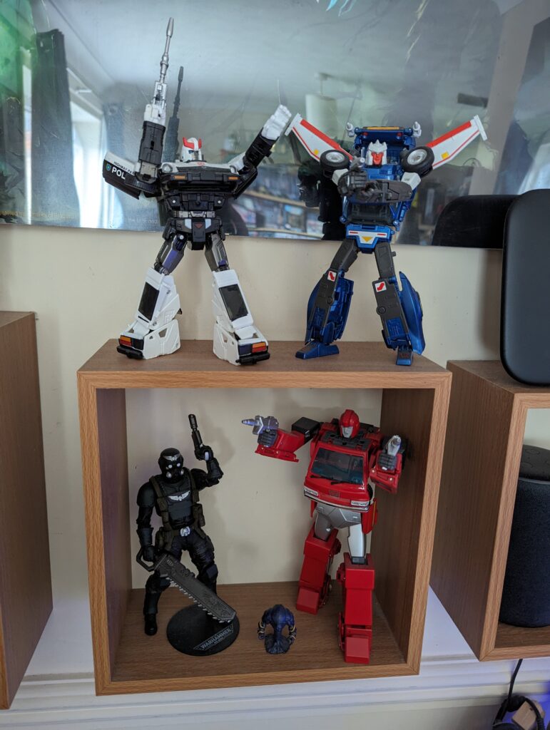 Transformers and Imperial Guardsman figurines